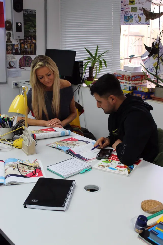 English teacher leading a class at Yorkshire College in Leeds
